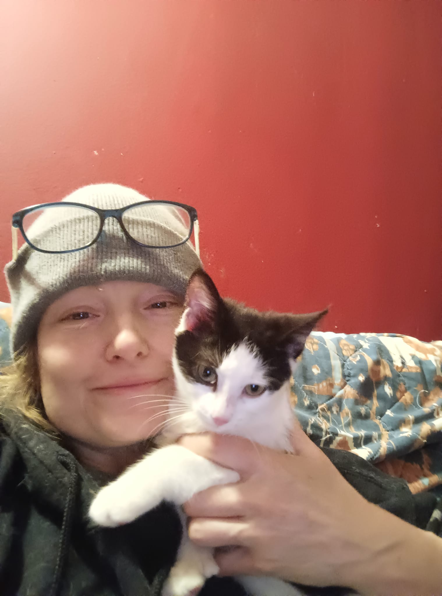 Elizabeth Cook Smiling and Holding a Trap Neuter Return Cat