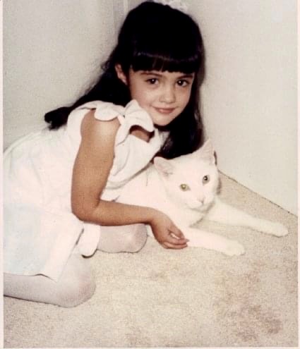 Katie Cleary as a Child with a Cat Katie Cleary as a Child with a Cat