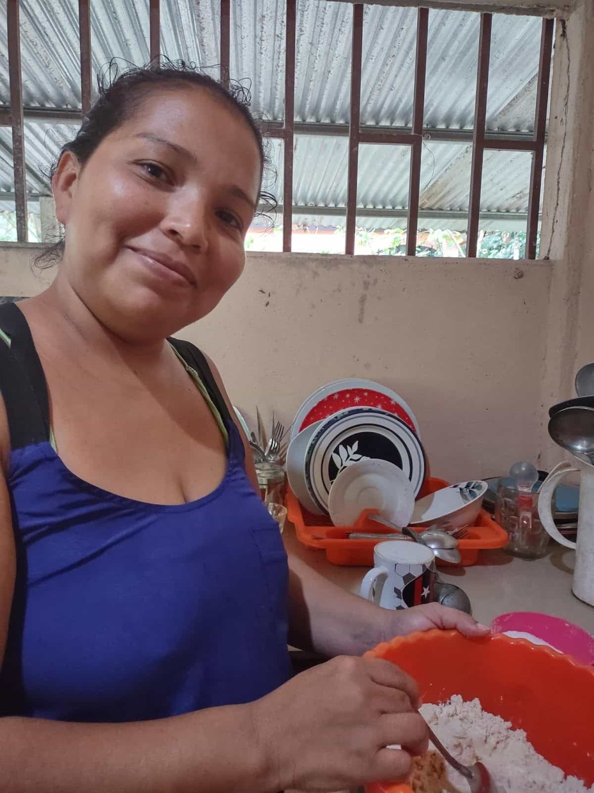 Jessica Stirring Mesa Flour and Water in a Bowl in Her Kitchen