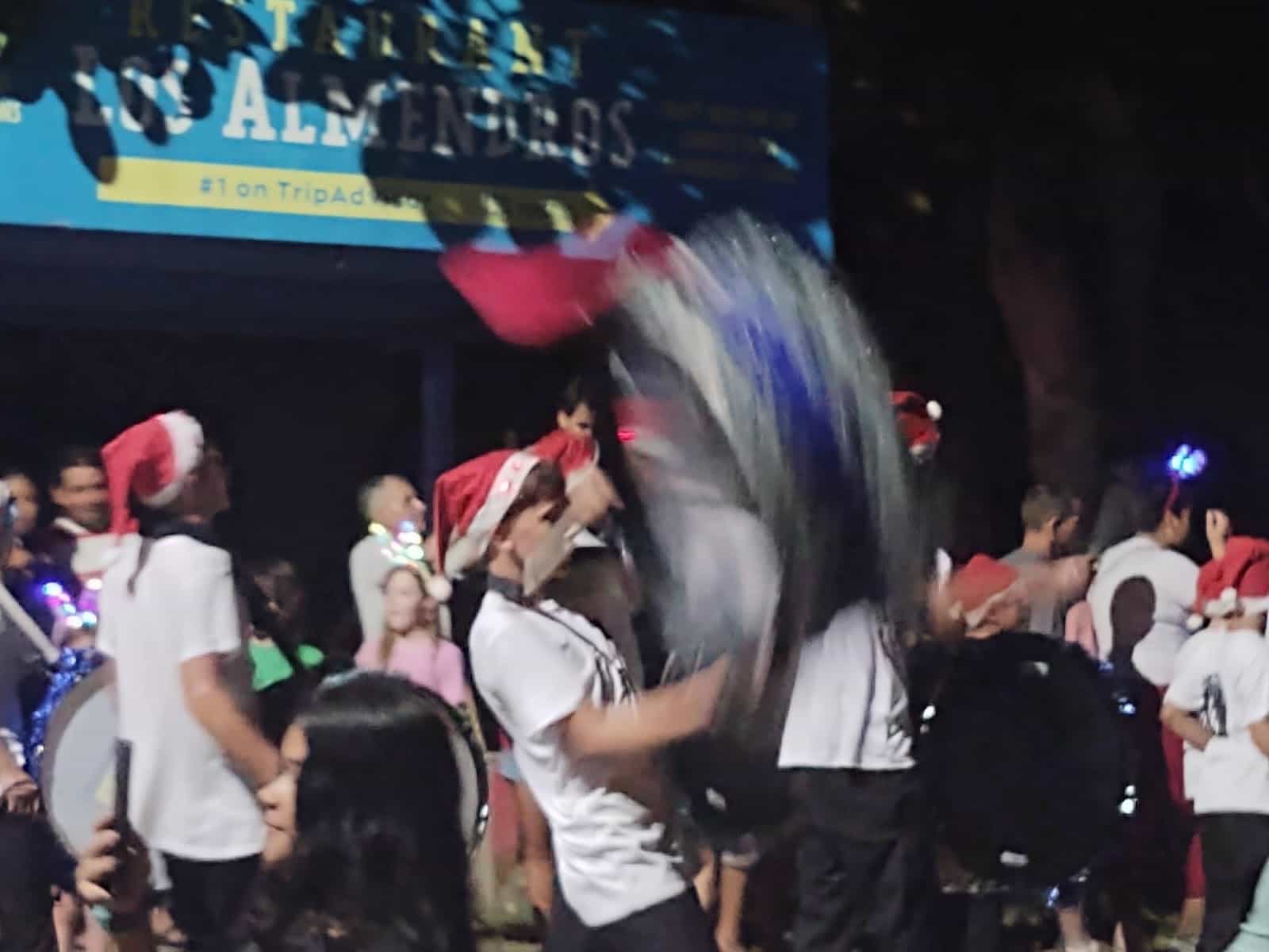 Marching Band With One of the Drummers Raising his Drum Up High in Esterillos Oeste