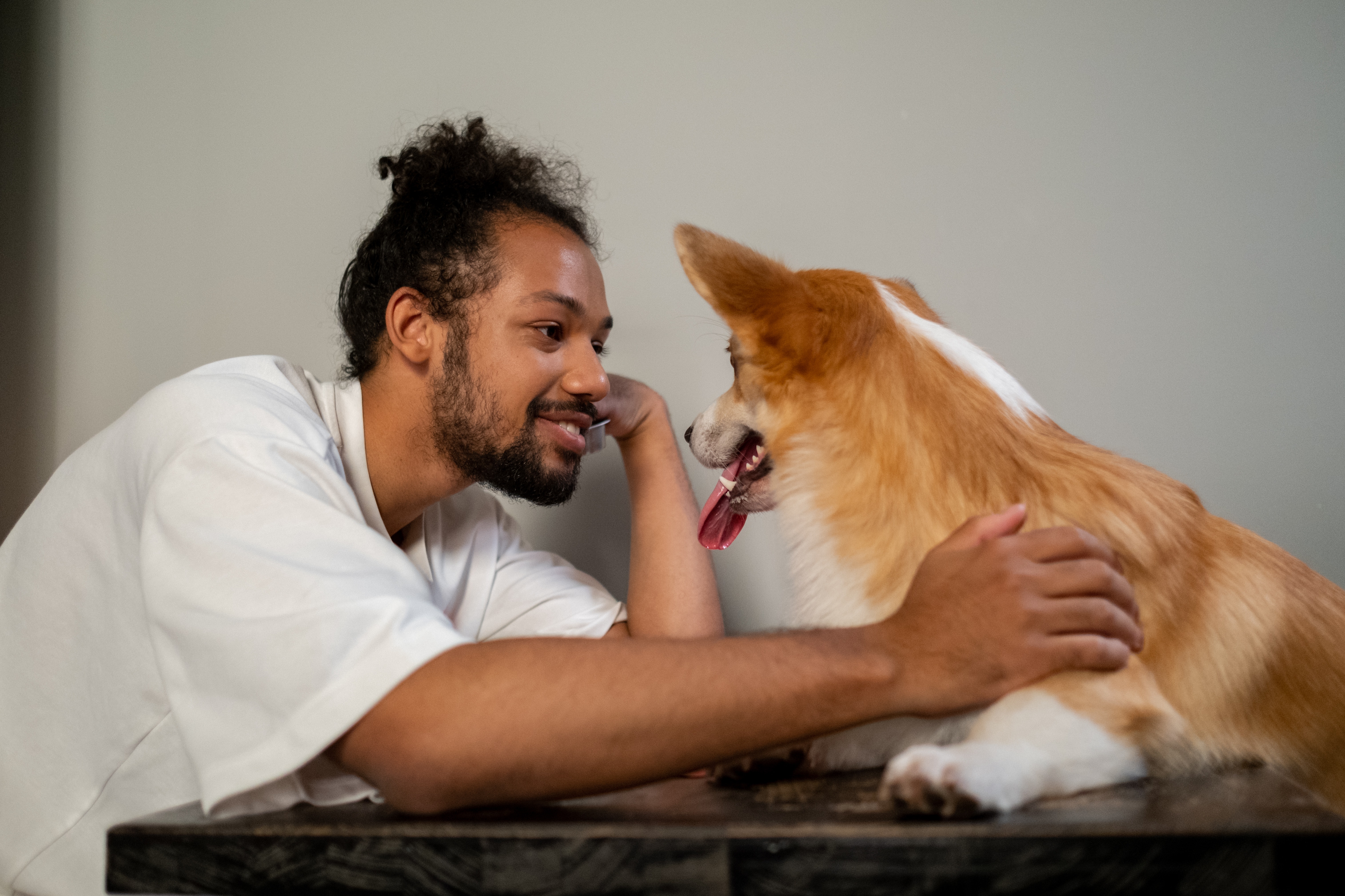 Dog and Owner Looking at Each Other and Looking Happy