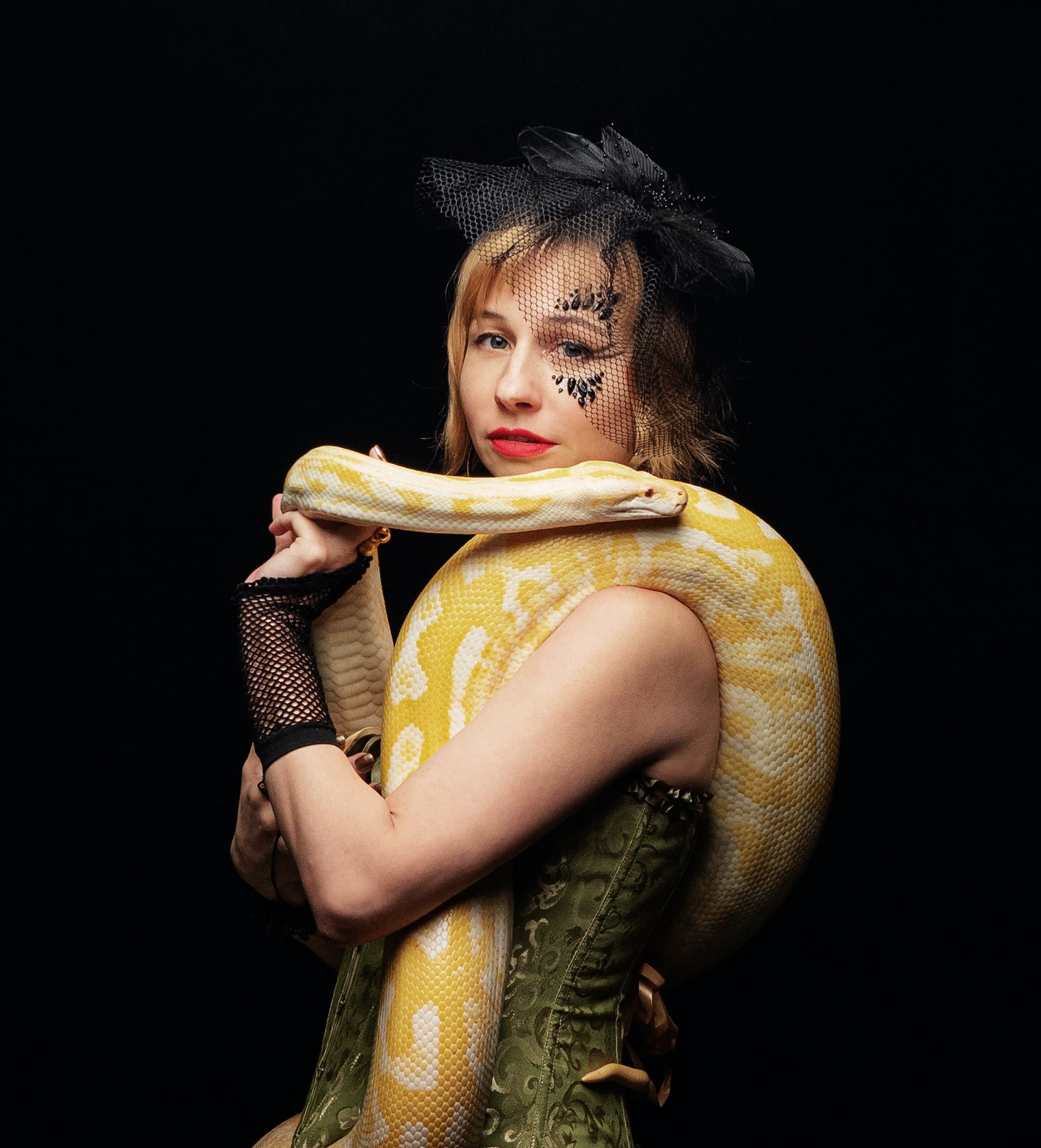 Woman with Big Live Yellow Snake on her Shoulders Woman with Big Live Yellow Snake on her Shoulders