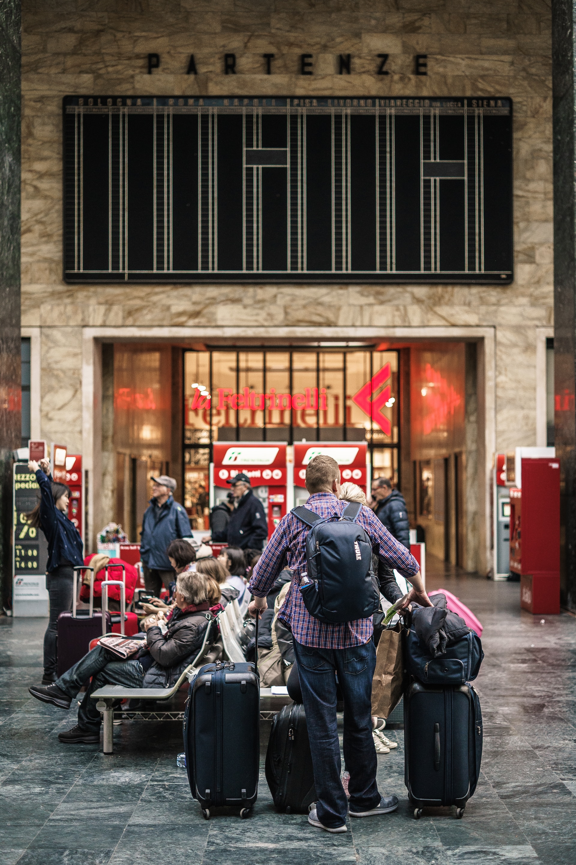 Tourists Crowding Around a Transportation Station - One of the Drawbacks of Overtourism Tourists Crowding Around a Transportation Station - One of the Drawbacks of Overtourism
