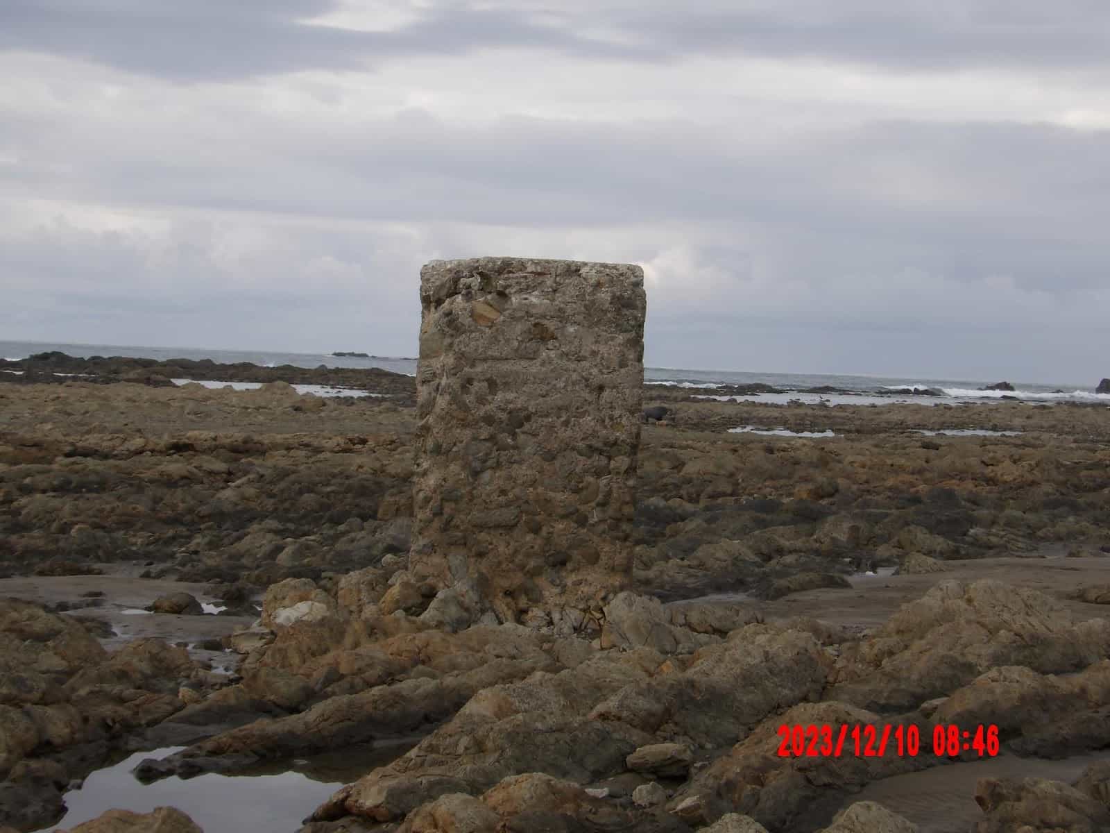 Standing on the Whale’s Tail During Low Tide. You Can See Rocks That Will Be Underwater at High Tide Standing on the Whale’s Tail During Low Tide. You Can See Rocks That Will Be Underwater at High Tide